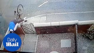 Speeding cyclist flips over garden wall after painful crash