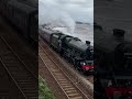 british railway 45596 ex lms 5596 jubilee class locomotive bahamas speeds along the seawall