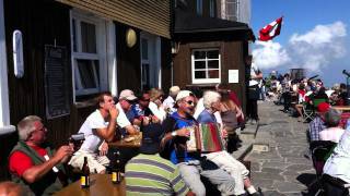 Swiss accordion player, Säntis mountain, Switzerland