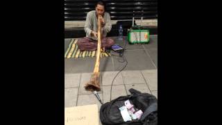 Hakgwai didgeridoo player in Central, Hong Kong