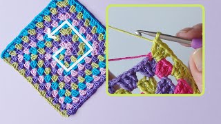 Crochet Multicolor Granny square in the spiral. Minimal Yarn Ends