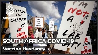South Africa anti-vaxxers harass health workers outside hospital