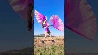 Pink flag wings in the blue sky #art #dance #flagpoi #wings #pink #bellydance