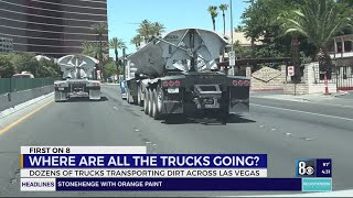 Large trucks carrying dirt cause traffic congestion along Las Vegas road