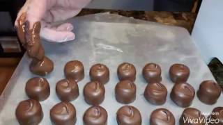 Hand Dipping from a Chocolate Melter