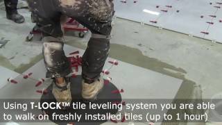 NEW WAY of tile installation - YOU WALK ON just installed tiles with T-Lock™ tile leveling system.