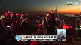 Visión 7: U2 calentó el invierno con "Invisible", desde la terraza del Rockefeller Center