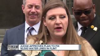 Judge approves plan to fix 18,000 Flint water lines