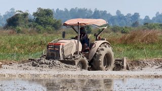 Great powerful of tractor Kubota M6040SU preparing land for planting / ត្រាក់ទ័រគូបូតាM6040SU