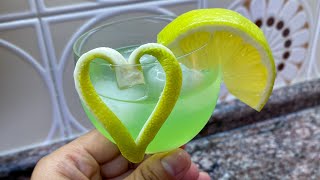 Mojito cocktail of fire with lemon heart shape