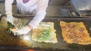 40 years old grandmother's green onion pancake with kimchi and seafood / Over 1,000 on weekends!