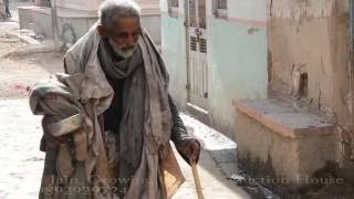 Homeless Poor Old Age Indian Man living Miserable Life in Junjani,Bhinmal,Rajasthan,India