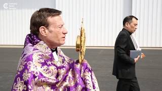 Priest flies with the Blessed Sacrament, statue of Mary to fight the coronavirus pandemic