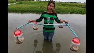 Awesome Girl Make Fish Trap Using PVC Pipes And Plastic Bottle To Catch Fish  At  Siem Reap