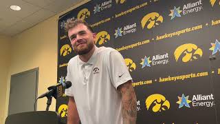 Iowa football quarterback Brendan Sullivan reacts after beating Northwestern, his former team