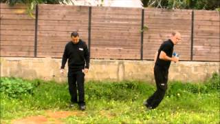 Krav Maga techniques: Neutralizing a Pistol threat from behind