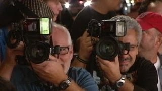 Hot Pursuit, Paparazzi Push Limits for Photographs