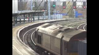 The Class 66 DB Cargo UK (Ex-EWS) with Rail Containers was now leaving at Carlisle Citadel Station.