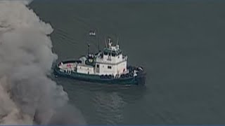A scrap metal barge catches fire in the Delaware Bay