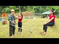 The kind boy helps clear the grass and the girl cleans up the farm - builds a new house