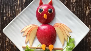 apple carving, owl with apple,  food art and styling.