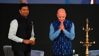Amazon's Jeff Bezos announces $1 billion investment into India businesses as business owners protest