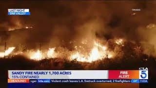 Tens of thousands still evacuated as crews continue battling Sandy Fire