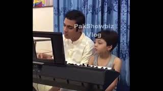 Pehlaj  hassan is playing piano with his father