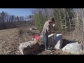 splitting a granite boulder by hand with sebago stonework