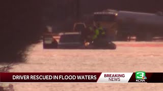 Driver rescued from flood waters on Twin Cities Road