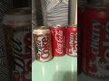 collection of vintage coke pepsi cans from the 70s and 80s. rare