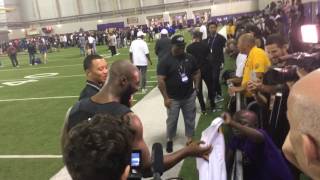 Leonard Fournette signs autograph for Superfan Jarius