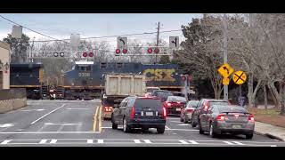 CSX 576 backs a setout for A720 through downtown WP 2021