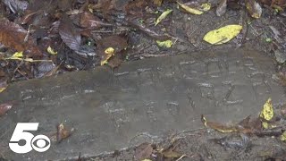 Fayetteville homeowner uncovers 1928 grave marker in backyard