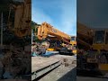 heavy load truck unloading crane kato 50 ton sr 500l from the top of the trailer