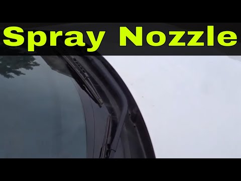 How do you fix a clogged nozzle on a windshield?