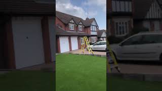 White UPVC cladding finished with black ash Tudor beams