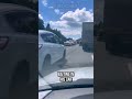 entitled driver on highway drives on the emergency lane