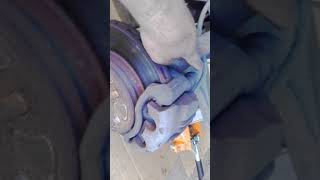 Removing front spring AU falcon without spring compressor