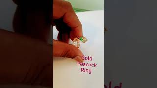 Gold peacock ring