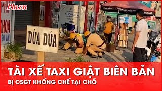 Clip CSGT khống chế tài xế taxi: Công an TP.HCM lên tiếng - PLO