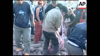 Aftermath of quake; amateur video, bodies, president at scene