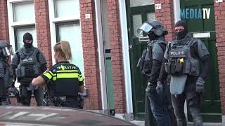 Arrestatieteam valt woning binnen Ampèrestraat Schiedam