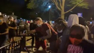 Protesters knock down White House security's barricade