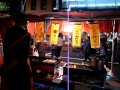 behind the stalls at the bettara ichi festival べったら市 111019 1917