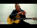 tommy emmanuel teaches how to play harmonics on the guitar