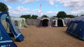 Inflatable tents on a very windy day.