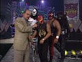 konnan bullies an injured rey mysterio during promo. wcw luchadores stand up for rey 1997