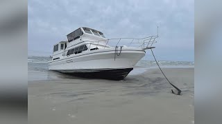 Yacht washes up on beach at Cape Hatteras National Seashore
