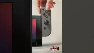 Nintendo Switch with gray Joy-Controller